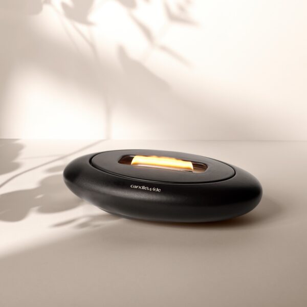 Candlewide Onyx Black refillable ceramic candle with a wide living flame